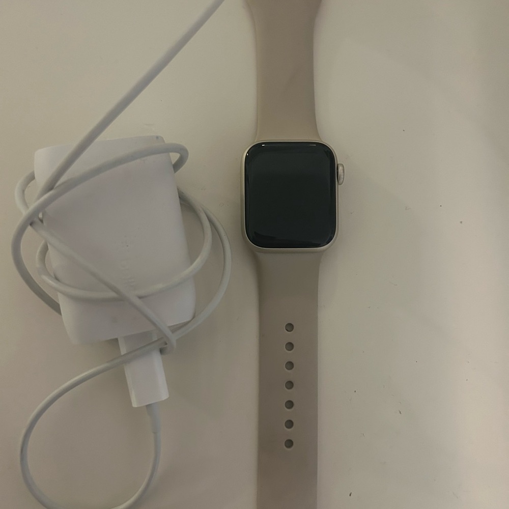 Apple Smartwatch with Beige Band and Silver Case